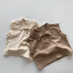 Detail of kids cotton sleeveless polo shirts in beige and brown with ribbed texture