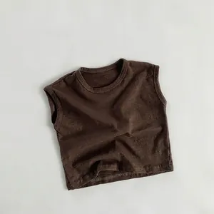 Detailed texture of breathable dark brown cotton sleeveless vest for kids in minimalist style