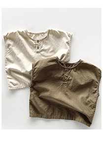 Close-up of lightweight linen cotton kids henley shirts in beige and olive green colors
