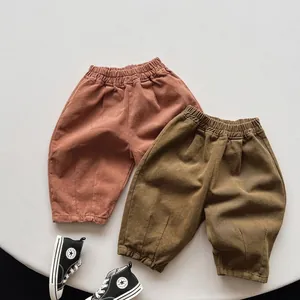 Pantalon carotte ample en velours pour enfants en rouge brique et vert olive