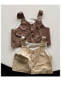 Detailed flat lay of cotton-linen kids vests in dark brown and beige with front buttons
