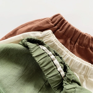 Kids linen cotton shorts in green, beige and brown with elastic waistband detail