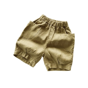 Short vintage en pur lin pour enfants avec taille élastique et grandes poches courbées
