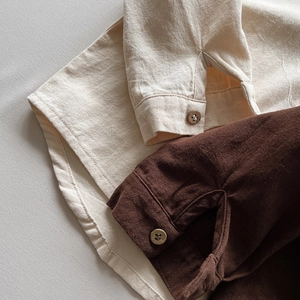 Kids cotton long sleeve shirts in beige and brown with wooden buttons detail