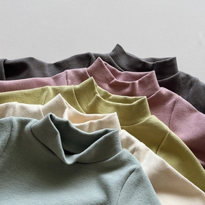 Detail view of colorful soft mock neck long sleeve thermal base layers for kids