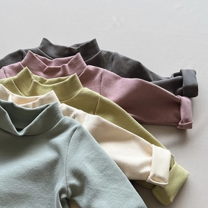 Detail showing five Morandi colors of soft ribbed knit kids' turtleneck undershirts