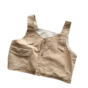 Minimalist khaki cotton children's vintage utility vest with wood buttons and pocket