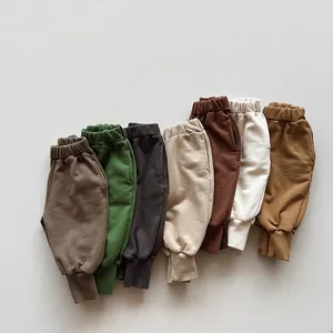 Kids cotton jogger pants in seven colors with elastic waist and ribbed cuffs flat lay