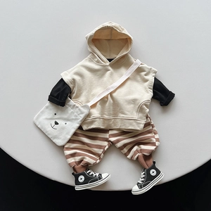 Three-piece set for kids including beige hoodie, striped pants, and cute bear bag