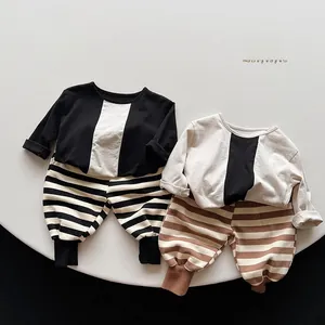 Detail of Korean style kids' cotton striped harem pants and matching long sleeve sweatshirt