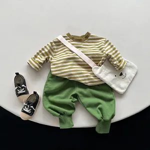 Kids striped yellow-green T-shirt and green pants set with a bear canvas bag
