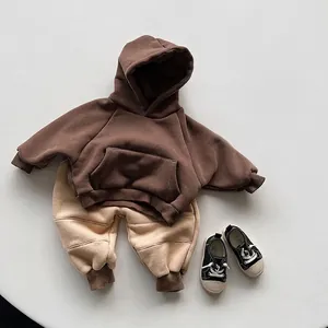 Kids winter fleece hoodie and jogger set in brown and beige minimalist style