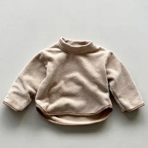 Kids minimalist warm fleece base layer top with a soft mock neck design in beige