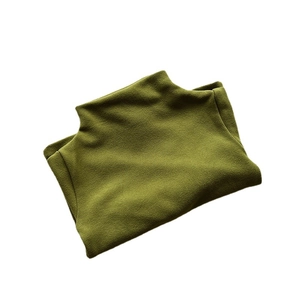 Folded olive green kids thermal shirt with semi-high collar for winter warmth