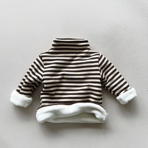 Detailed close-up showing thick white fleece lining of striped kids thermal turtleneck top