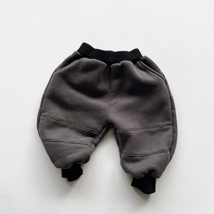Detail of children's fleece jogger with contrast ribbed waistband and warm fleece texture