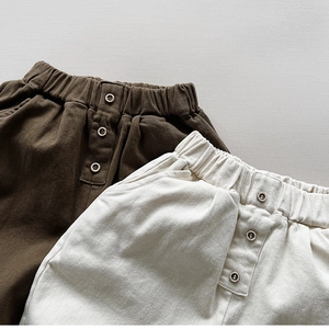 Kids' minimalist cotton fleece pants with elastic waist and decorative buttons