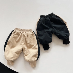 Detailed view of children's thick fleece-lined jogger pants with contrast stitching