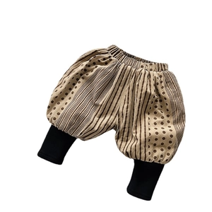 Kids warm patchwork harem pants with brown dots and stripes in a loose casual style