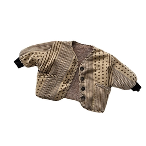 Thick winter jacket for kids with polka dots, vertical stripes, and warm fleece lining