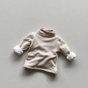 Detailed view of the warm knit texture and soft sherpa fleece cuffs on the toddler thermal top