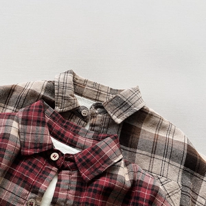 Close-up of thick flannel plaid shirts for kids showing collar detail and soft warm lining