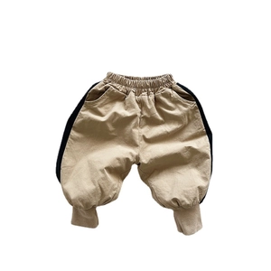 Thick winter joggers for kids in khaki with black side stripes and elastic waist