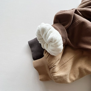 Winter fleece-lined pants for kids with warm sherpa lining and ribbed elastic cuffs