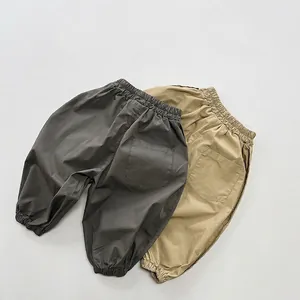 Kids casual cotton cargo pants in dark grey and khaki with elastic waist and cuffs