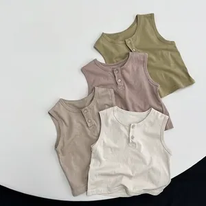Flat lay of cotton Henley neck toddler vests in olive, pink, khaki, and cream colors