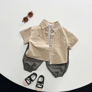 Kids minimalist casual 3-piece set with beige shirt, striped tee and grey jogger pants