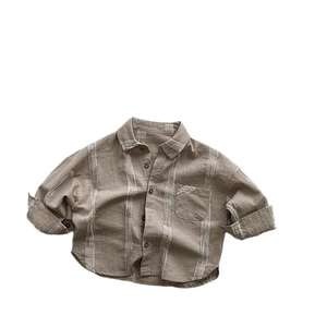 Chemise enfant kaki à manches longues en coton avec texture rayée et poche avant