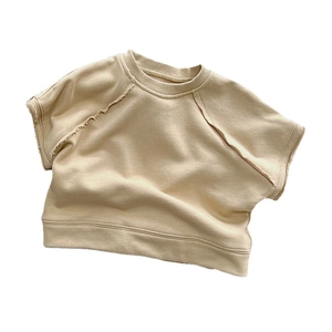 Minimalist beige cotton raglan sweatshirt for kids featuring retro raw edge stitching