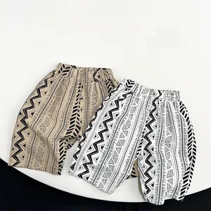 Close-up of kids geometric print cotton wide-leg shorts with elastic waist for summer
