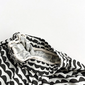 Linen blend girls casual pants with black and white wave pattern and elastic waistband