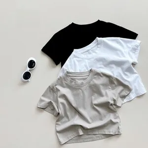 Detail view of bamboo cotton kids shorts stacked in black white and grey colors