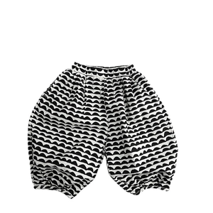 Linen blend girls cropped harem pants with black and white wavy print and elastic hem