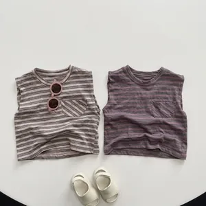 Detail showing two striped cotton tank tops for kids in brown and purple colors