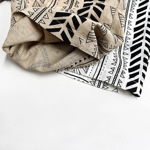 Close-up of geometric tribal print on breathable slub cotton cropped pants fabric