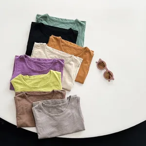 Close-up of breathable slub cotton texture on multi-color summer tank tops for kids