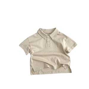 Minimalist beige cotton polo shirt for kids featuring classic collar and side slits