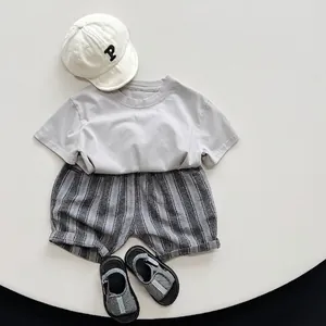 Toddler summer set with grey cotton t-shirt and striped shorts in casual Korean style