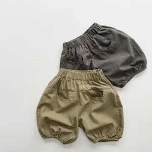Close-up of kids linen cotton anti-mosquito pants with elastic waist and side pockets