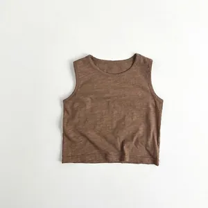 Detailed view of brown slub cotton tank top showing breathable ribbed fabric texture