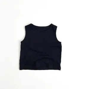 Detail of children's black bamboo cotton tank top with ribbed texture and neat neckline