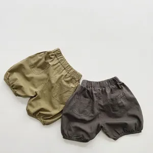 Kids cotton lantern shorts set in olive green and dark grey with elastic waist and pockets