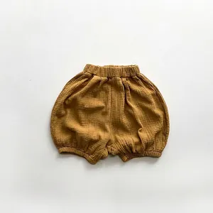 Macro detail of breathable ginger cotton gauze bloomers for toddlers with elastic cuffs