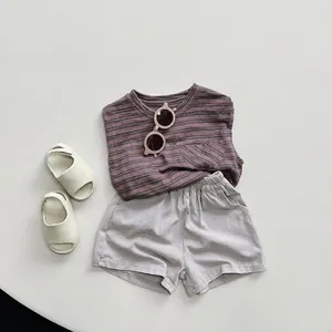 Kids striped purple t-shirt and grey cotton shorts summer outfit set with sandals