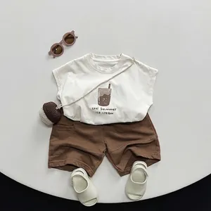 Kids summer casual cotton set featuring white ice cream T-shirt and brown knit shorts