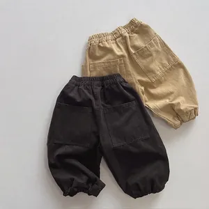 Kids loose cotton joggers in khaki and brown with elastic waist and square back pockets
